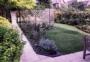 Flowering plants surround the main lawn